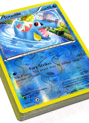 Pokémon trading card featuring Totodile on a white background